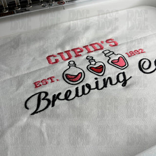 Valentines Day Embroidery Design, Cupid's Brewing Co Embroidery Design with Repositional Hoop Sizes, 5x12, 4x6.75, 6x10, 5x7, 4 sizes - Blue Gem Embroidery